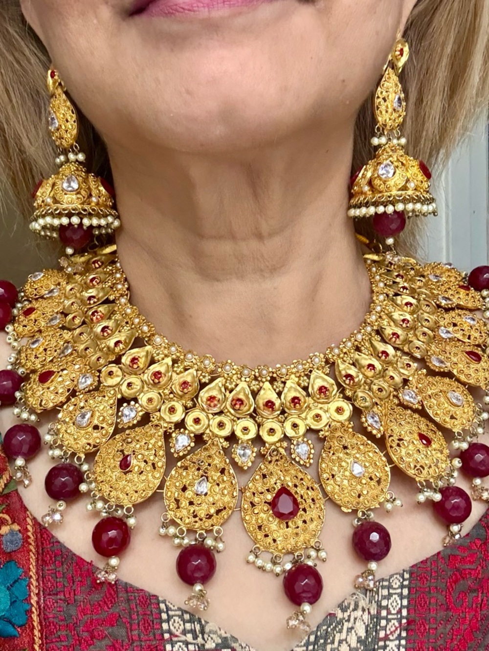 Elegant Gold-plated Necklace and Jhumka Earring wedding Set with Red Gem Accents